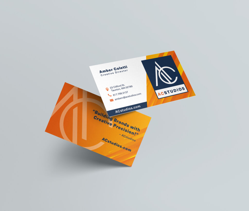 Business cards for AC Studios. Orange, blue, and white colors on business card.